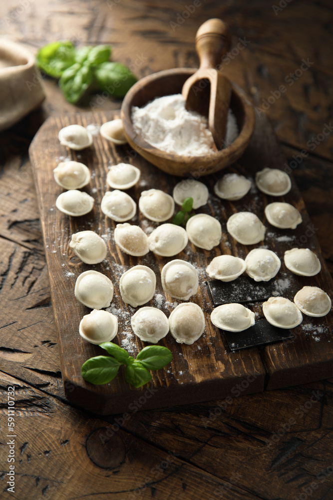 Traditional homemade dumplings on a wooden desk Traditional homemade dumplings on a wooden desk