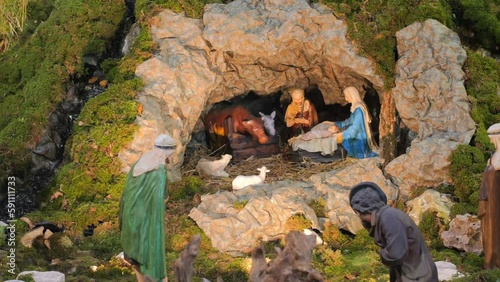Nativity Scene Inside Roman Catholic Church - Art Objects Representing The Birth of Jesus In A Barn. - close up photo