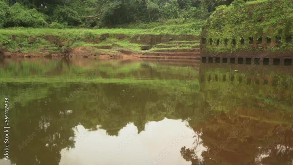 15th-century Sri Saptakoteshwar Temple in Divar Island, Goa, boasts a restored pond with carved niches. Built by Kadamba Kings, it is a stunning showcase of ancient Indian architecture and culture. 15th-century Sri Saptakoteshwar Temple in Divar Island, Goa, boasts a restored pond with carved niches. Built by Kadamba Kings, it is a stunning showcase of ancient Indian architecture and culture.