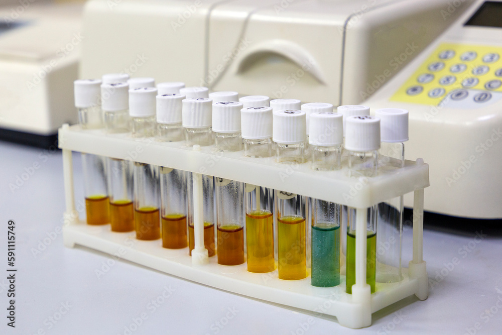 Test tubes with multicolored reagent analysis. Colorimetry experiment
