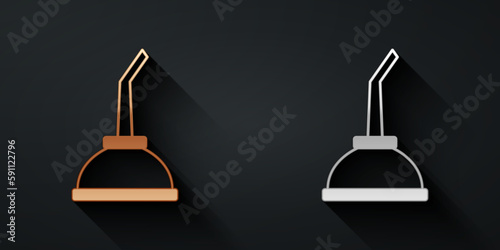 Gold and silver Canister for motor machine oil icon isolated on black background. Oil gallon. Oil change service and repair. Long shadow style. Vector