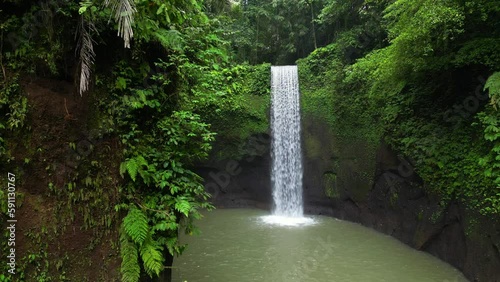 Tibumana Waterfall referred to by locals as Air Terjun Tibumana is one of the most beautiful hidden waterfalls in Bali, which located in Bangli region. photo