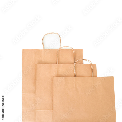 Craft bags on a white background without a logo. Space for text. Top view. The concept of packaging, gift.