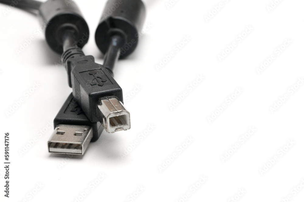 USB A and USB B printer plug cable on white background USB A and USB B printer plug cable on white background