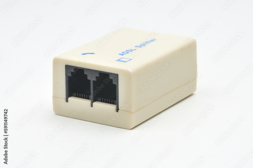 Splitter for connecting the phone and ADSL router to the Internet on a white background Splitter for connecting the phone and ADSL router to the Internet on a white background