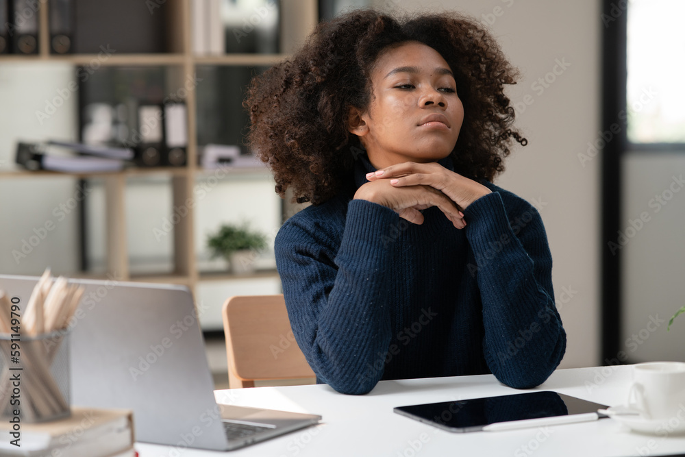 Asian woman sitting stressed with being an office worker Asian woman sitting stressed with being an office worker
