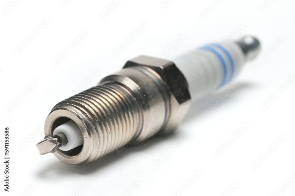 Car spark plug on isolated white background Car spark plug on isolated white background