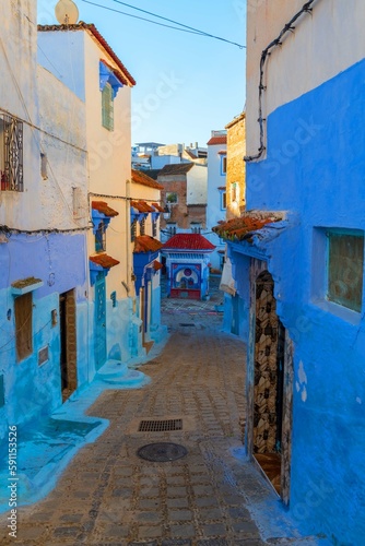 The narrow streets in the Blue City of Morocco © Philippe