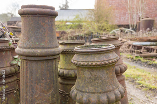 Chimney pots in a salvage yard