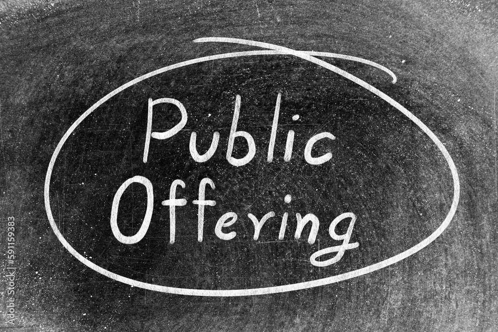 White chalk hand writing in word public offering and circle shape on blackboard background White chalk hand writing in word public offering and circle shape on blackboard background
