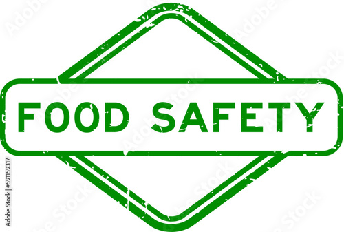 Grunge green food safety word rubber seal stamp on white background