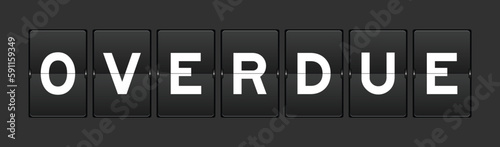 Black color analog flip board with word overdue on gray background