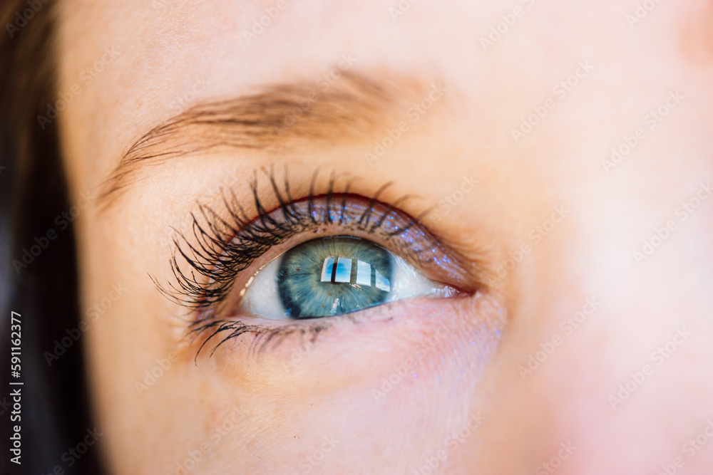 Beautiful gray-blue eyes with long lashes. Young woman, a girl is looking up. Dreaming, praying, turning to God concept. Visual gymnastics for improving vision. Female look on a sky with a hope. Beautiful gray-blue eyes with long lashes. Young woman, a girl is looking up. Dreaming, praying, turning to God concept. Visual gymnastics for improving vision. Female look on a sky with a hope.