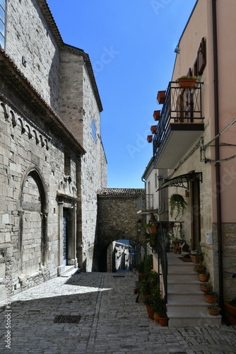 A narrow street among the old houses of Guardialfiera, a historic town in the state of Molise in Italy. © Giambattista