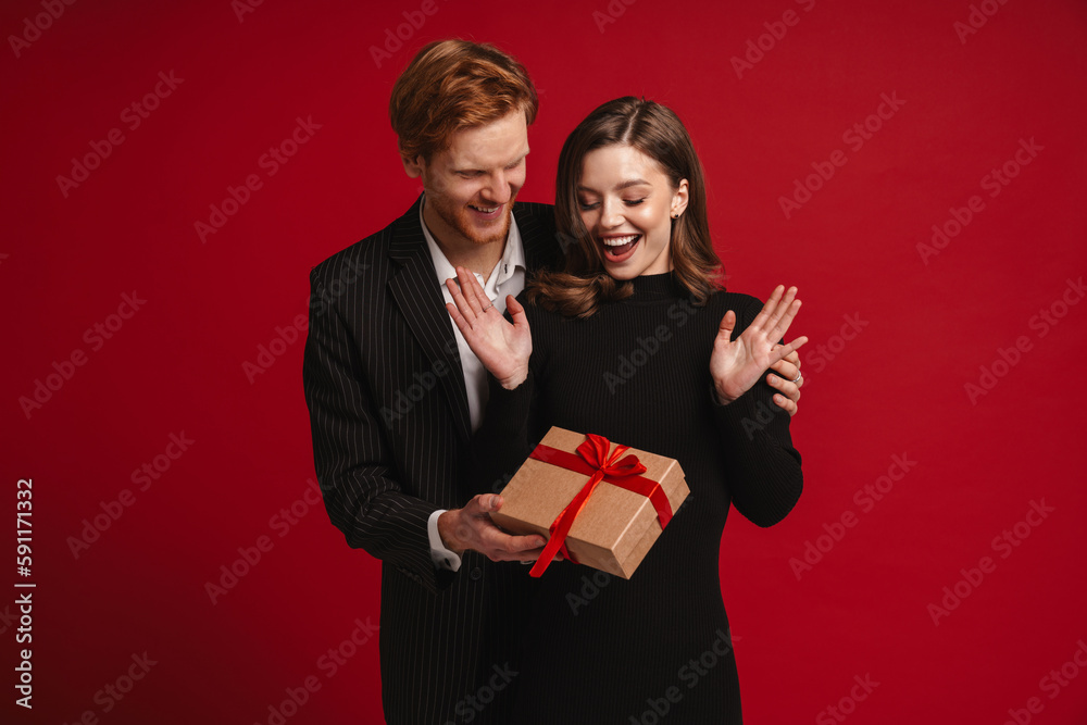 Man Giving Gift Card Beautiful Smiling Woman Home Stock Photo by