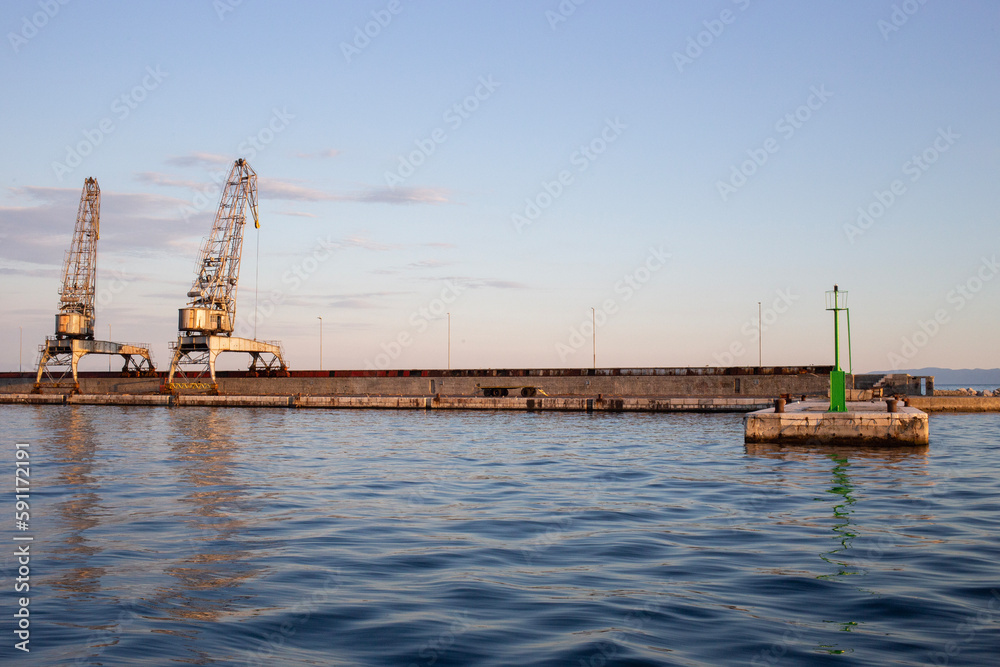 Fototapeta premium Sea port, cargo cranes, summer