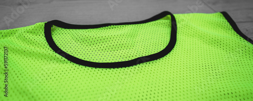 Sport green shirtfront is uniform for athletes training and practice close up view. photo