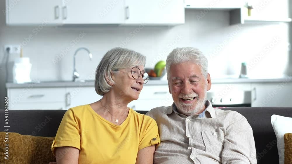 Sixty years couple, elderly parents communicates with grown up children using modern technologies makes video call, wave hands gesture of hello or goodbye sign, older generation and internet concept
Sixty years couple, elderly parents communicates with grown up children using modern technologies makes video call, wave hands gesture of hello or goodbye sign, older generation and internet concept