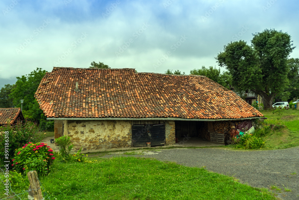 Old barn with a tiled roof, Basque Country, Spain. Old barn with a tiled roof, Basque Country, Spain.