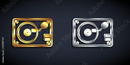 Gold and silver Vinyl player with a vinyl disk icon isolated on black background. Long shadow style. Vector