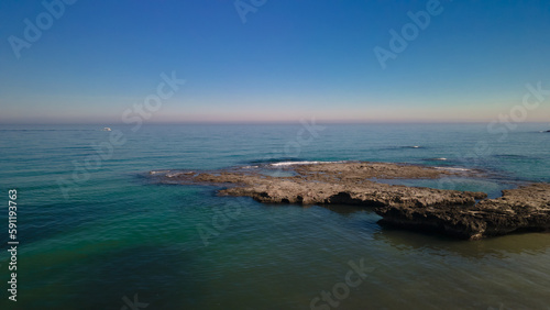A bird's eye view of the sea, coastline of Rocky Italy Puglia