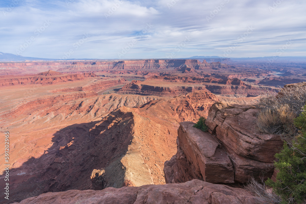 hiking the dead horse trail in dead horse point state park in utah, usa hiking the dead horse trail in dead horse point state park in utah, usa