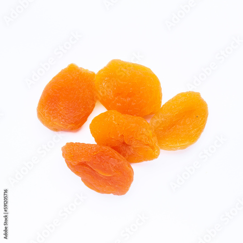 Dried apricots isolated on white background. Top view, flat lay.