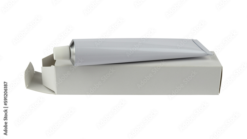 White cream tube on its white open box isolated from background White cream tube on its white open box isolated from background