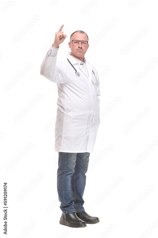 Cheerful mature doctor looking at camera and pointing away Cheerful mature doctor looking at camera and pointing away