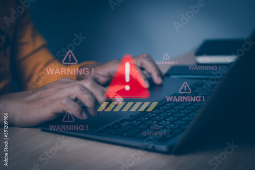 Users display warnings for accessing malicious cyber attack virus software or threats to hack online networks. Technological security with computer, concept warning or notification technology scam
