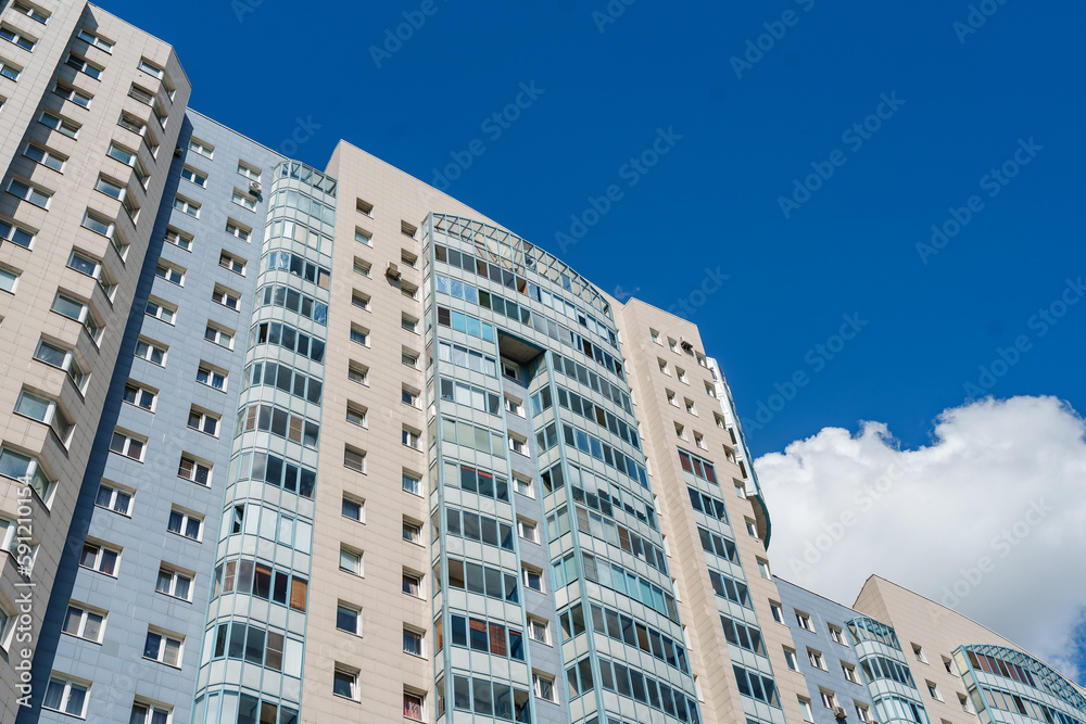 Multi-storey apartment building with many windows