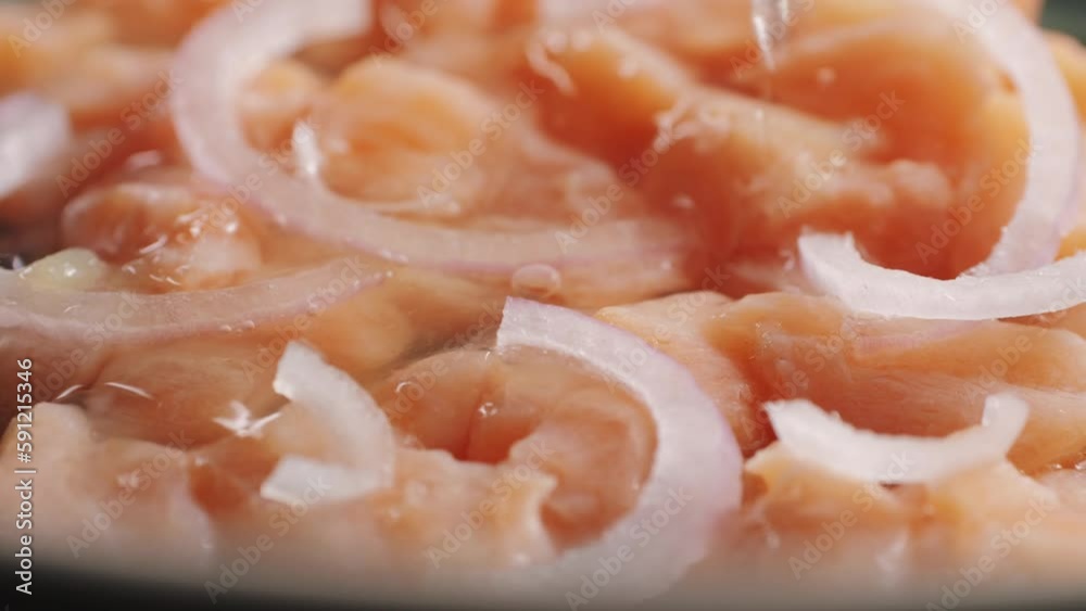 Chilean salmon seviche with pouring lemon lime and grapefruit juice, onion Healthy diet food, close up Chilean salmon seviche with pouring lemon lime and grapefruit juice, onion Healthy diet food, close up
