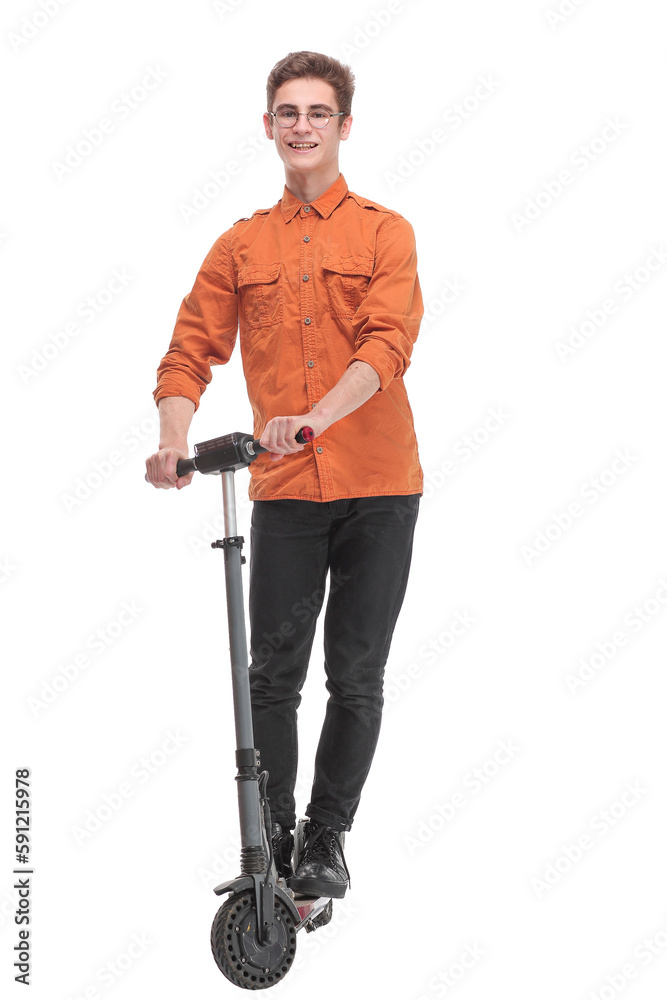 Pleasant smiling man riding a kick scooter Pleasant smiling man riding a kick scooter