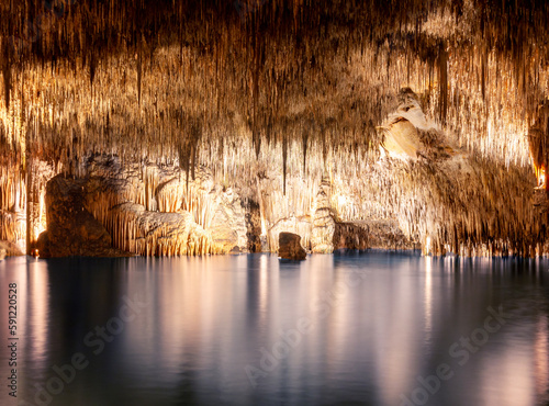 Underground lake in Dragon cave (Cuevas del Drach), Porto Cristo, Mallorca island, Spain photo