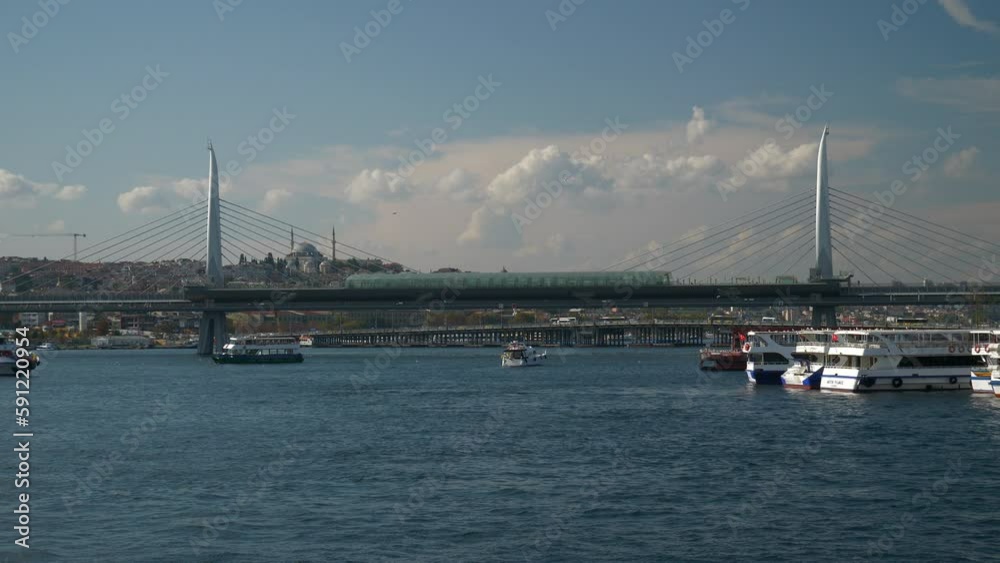 sunny day istanbul city golden horn traffic metro bridge slow motion panorama 4k turkey 