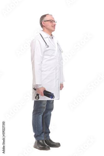 Male doctor holding blood pressure monitor on white background