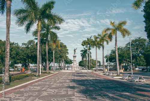 Fausto Cardoso Square in Aracaju, Brasil. Big statue between the trees photo