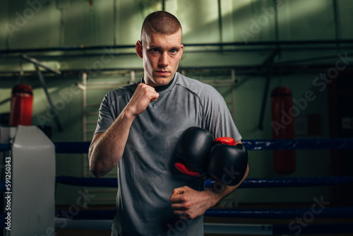 Portrait of a Caucasian male boxer looking at the camera © cherryandbees