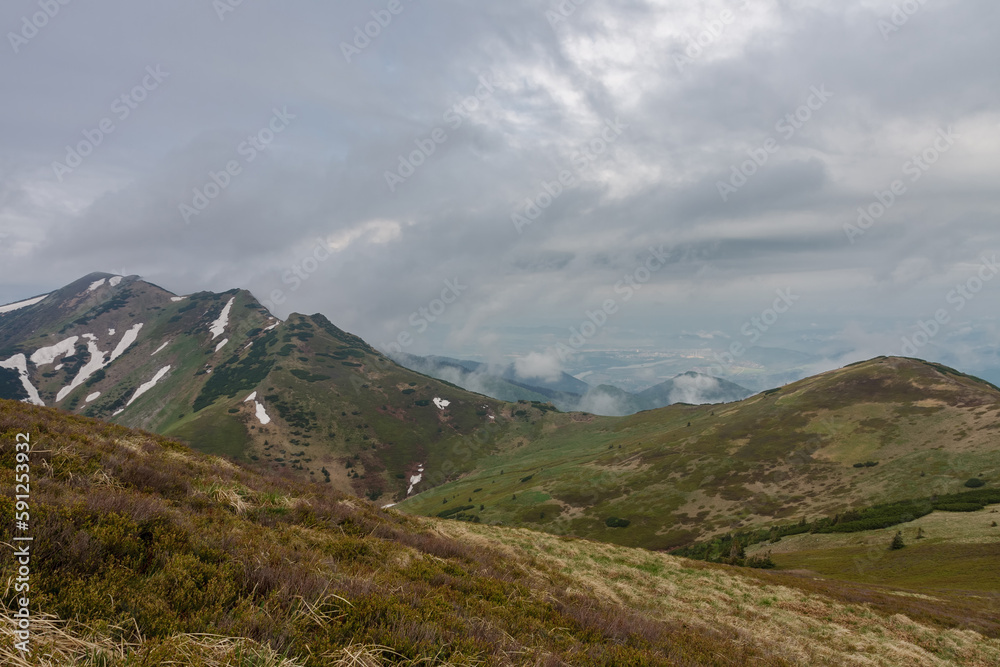 Maly Krivan, mountain in Mala Fatra, Slovakia, view from mountain Pekelnik, in spring cloudy day