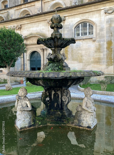 Stone fountain in cathedral courtyard, Ragusa, Sicily