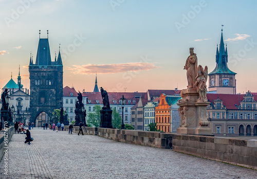Charles Bridge (Karluv Most) and Prague old town architecture at sunrise, Czech Republic