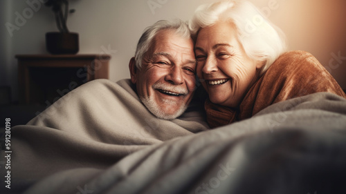 Happy senior couple under blanket. Created with Generative AI.