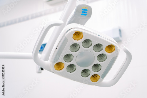 Surgical lamp for dental treatment and surgery. Dental equipment in dentist clinic. Led lamp used by dentists.