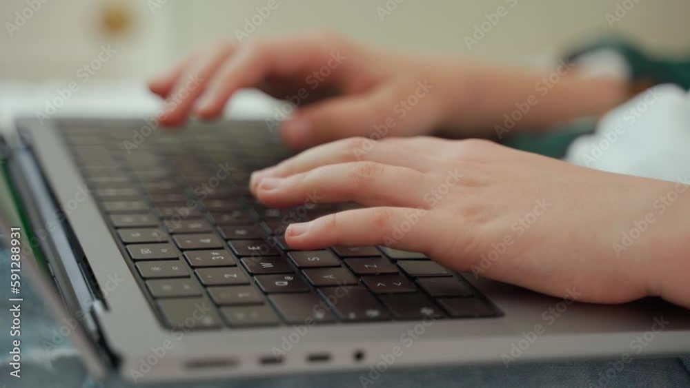 Close up teenage hands typing keyboard using laptop online educational programming lesson course at home. Distance learning course remote video conference. School boy study does school homework. Close up teenage hands typing keyboard using laptop online educational programming lesson course at home. Distance learning course remote video conference. School boy study does school homework.