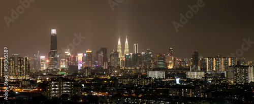Photography Night time panoramic view of Kuala Lumpur city with copy space