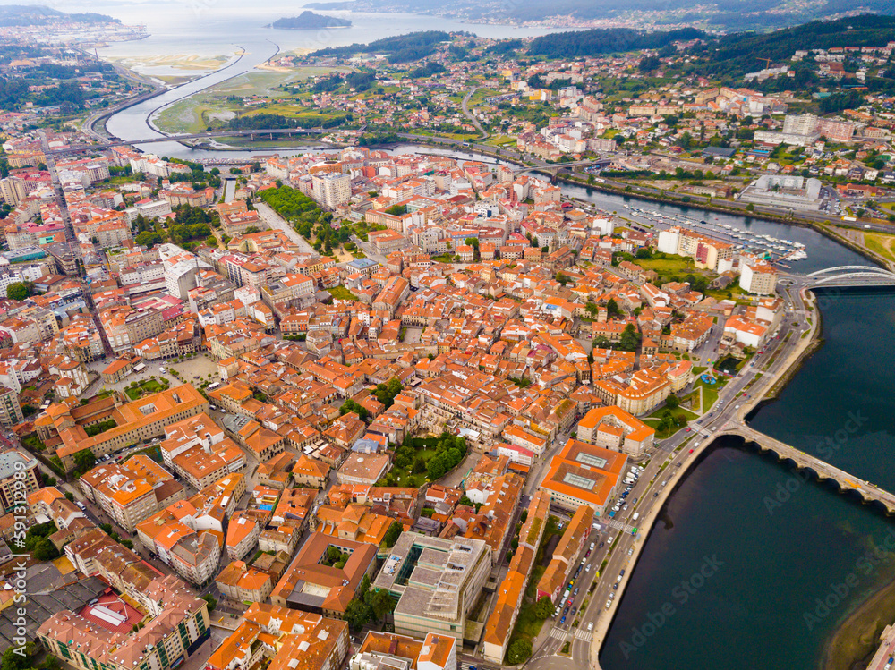Panoramic aerial view of Pontevedra with view of buildings and sea bay, Spain
