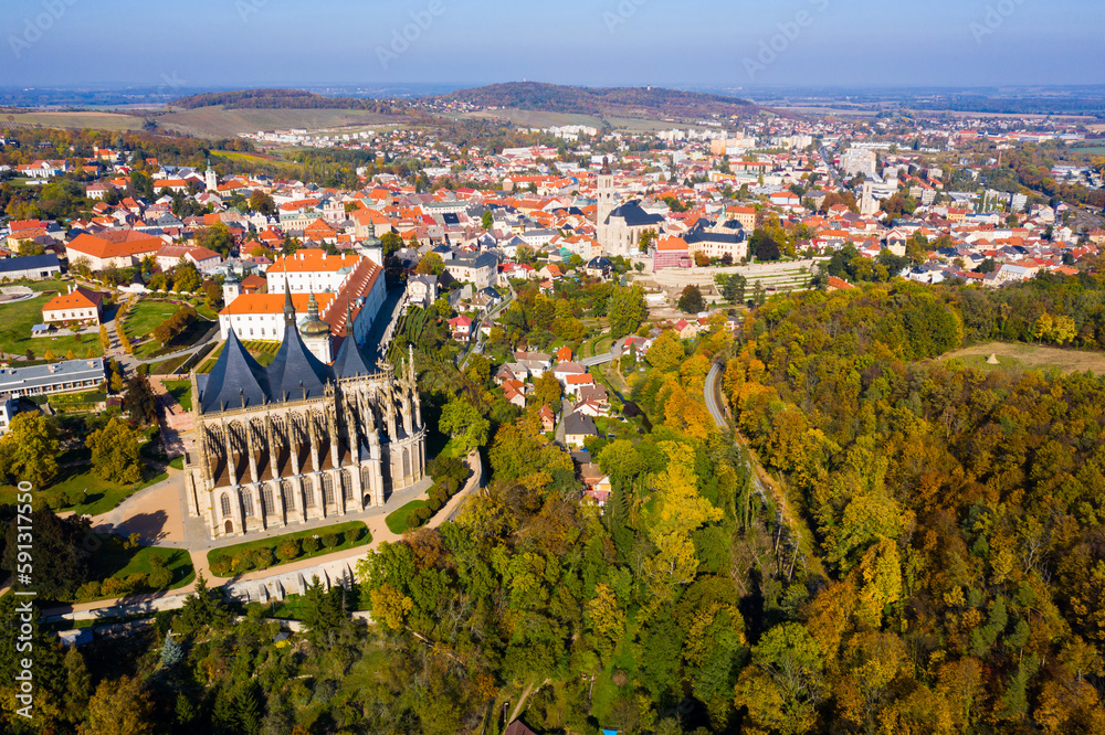 Autumn cityscape of Kutna Hora with famous gothic Roman Catholic church of Saint Barbara and Baroque building of Jesuit College, Czech Republic..