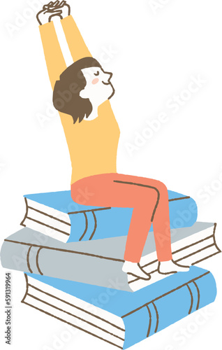 本の上で腕を伸ばしている女性_色