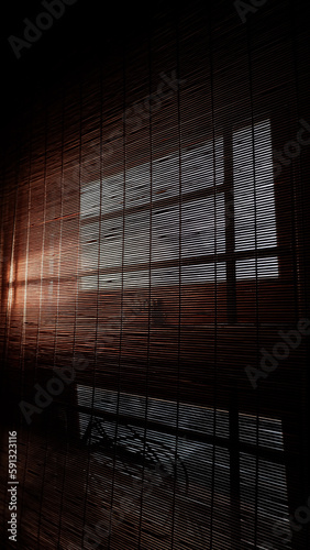 Morning sunlight streams in through the cracks in the windows of the house