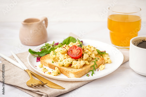 Plate with tasty scrambled ...